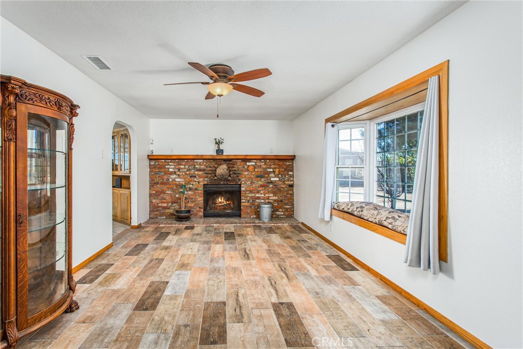 7045 Oak Hill Road Oak Hills, CA 92344 - Photo 5 of 30 Formal living room with fireplace