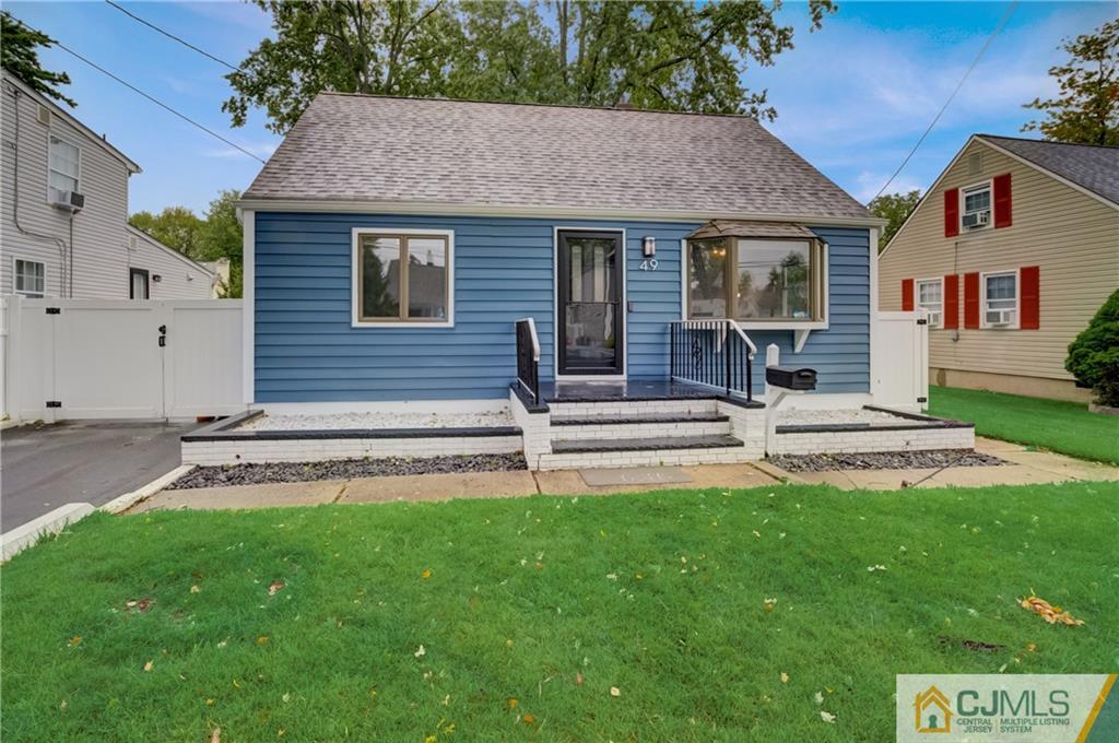 a house view with a garden space