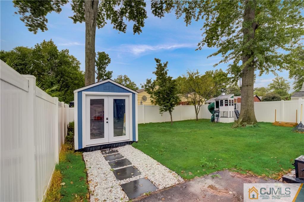 49 West Cliff Road Colonia, NJ 07067 - Photo 24 of 33 a front view of a house with garden