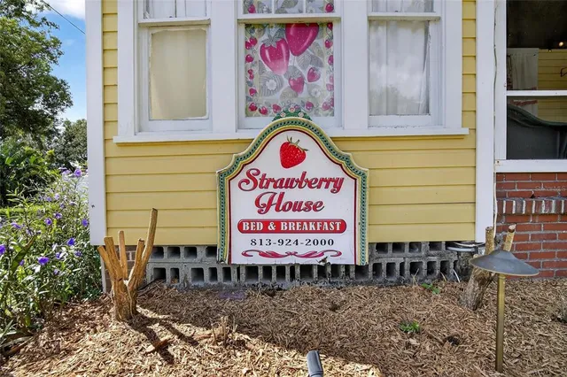 a sign on the wall of a building