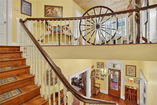 a bed room with bed and a chandelier