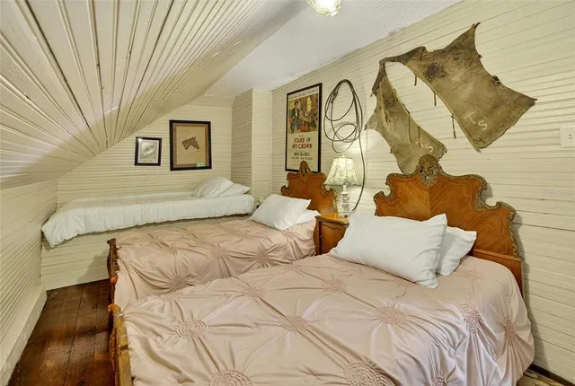 a view of a chairs and table in the balcony