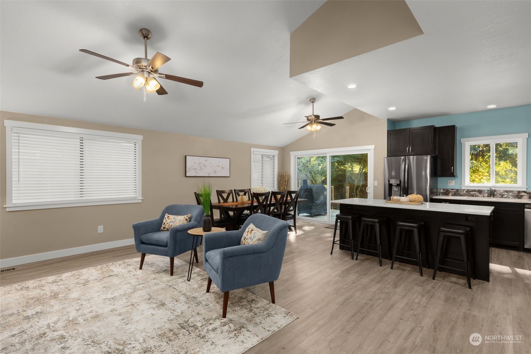 17547 Southeast 135th Street Renton, WA 98059 - Photo 11 of 37 a living room with furniture and a large window