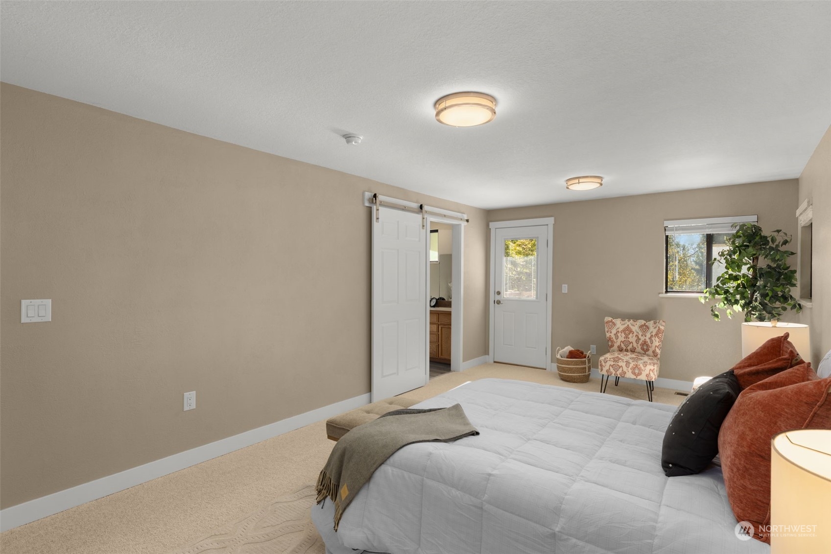 17547 Southeast 135th Street Renton, WA 98059 - Photo 18 of 37 a bedroom with a bed and window