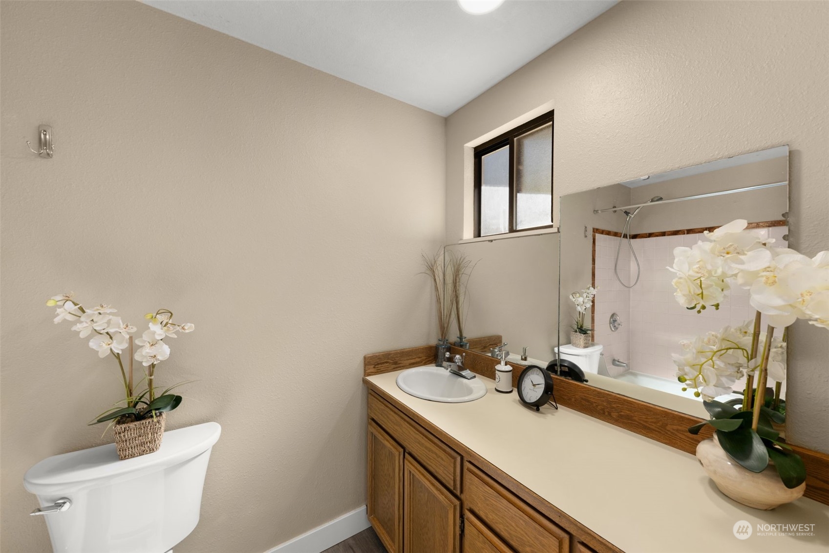 17547 Southeast 135th Street Renton, WA 98059 - Photo 20 of 37 a bathroom with a sink and a mirror