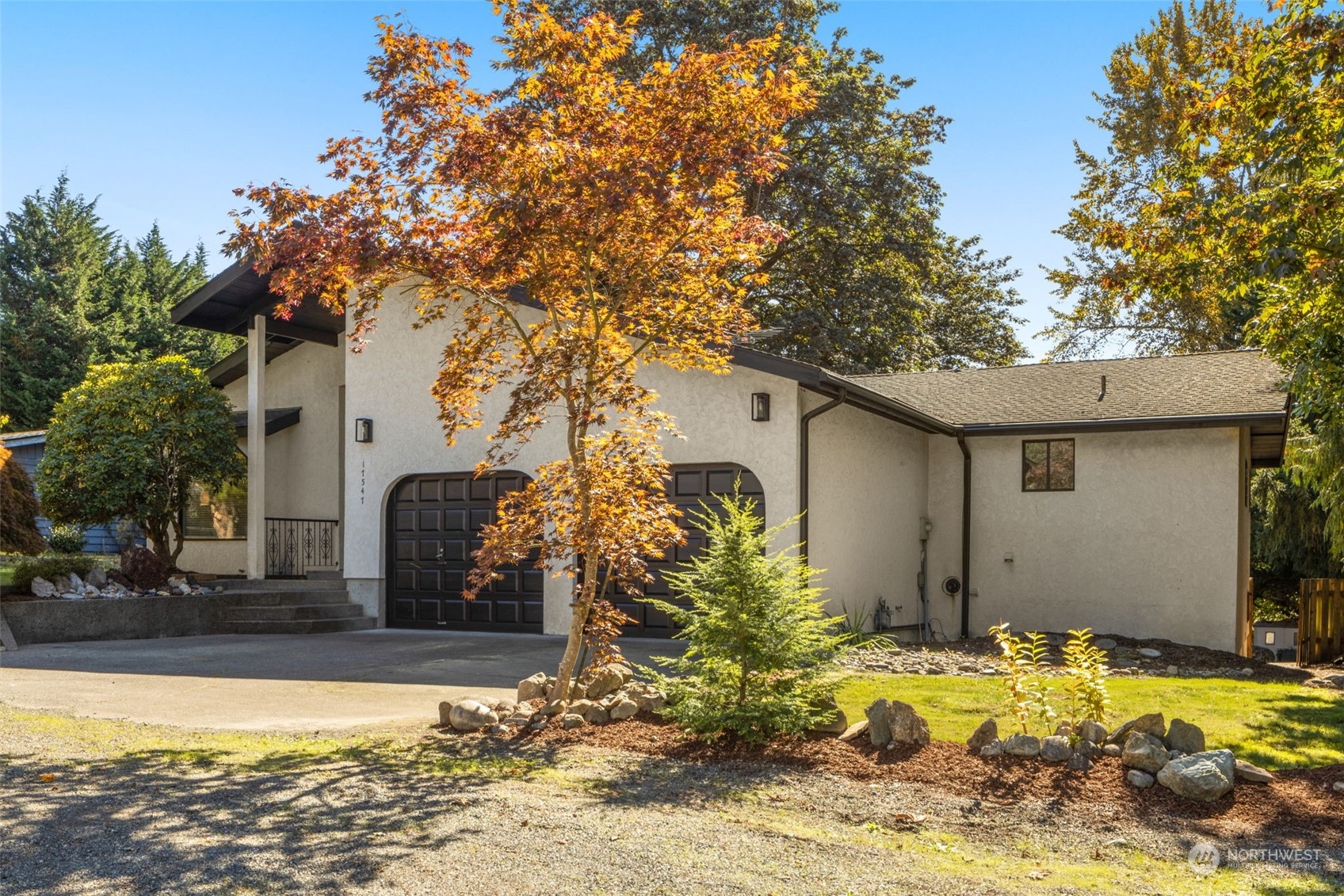 17547 Southeast 135th Street Renton, WA 98059 - Photo 2 of 37 a view of a house with swimming pool and sitting area
