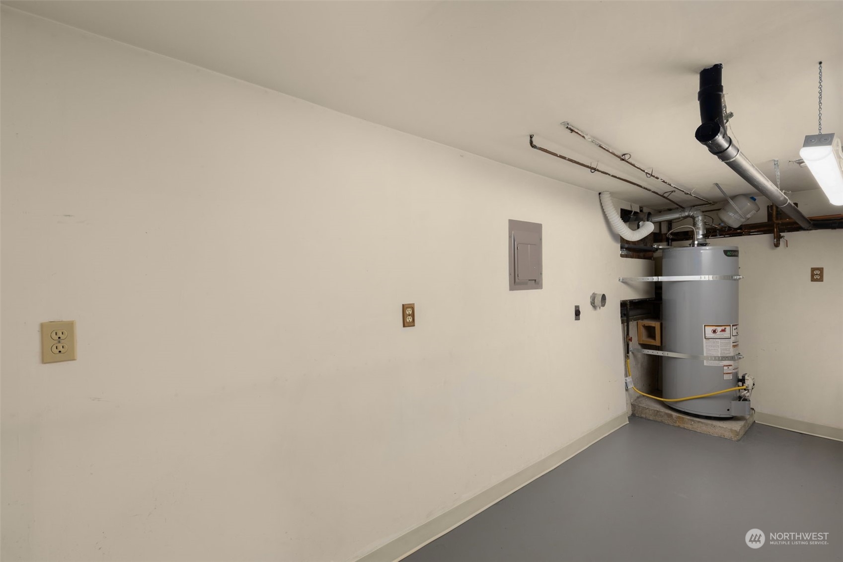 17547 Southeast 135th Street Renton, WA 98059 - Photo 29 of 37 a view of storage and utility room with refrigerator