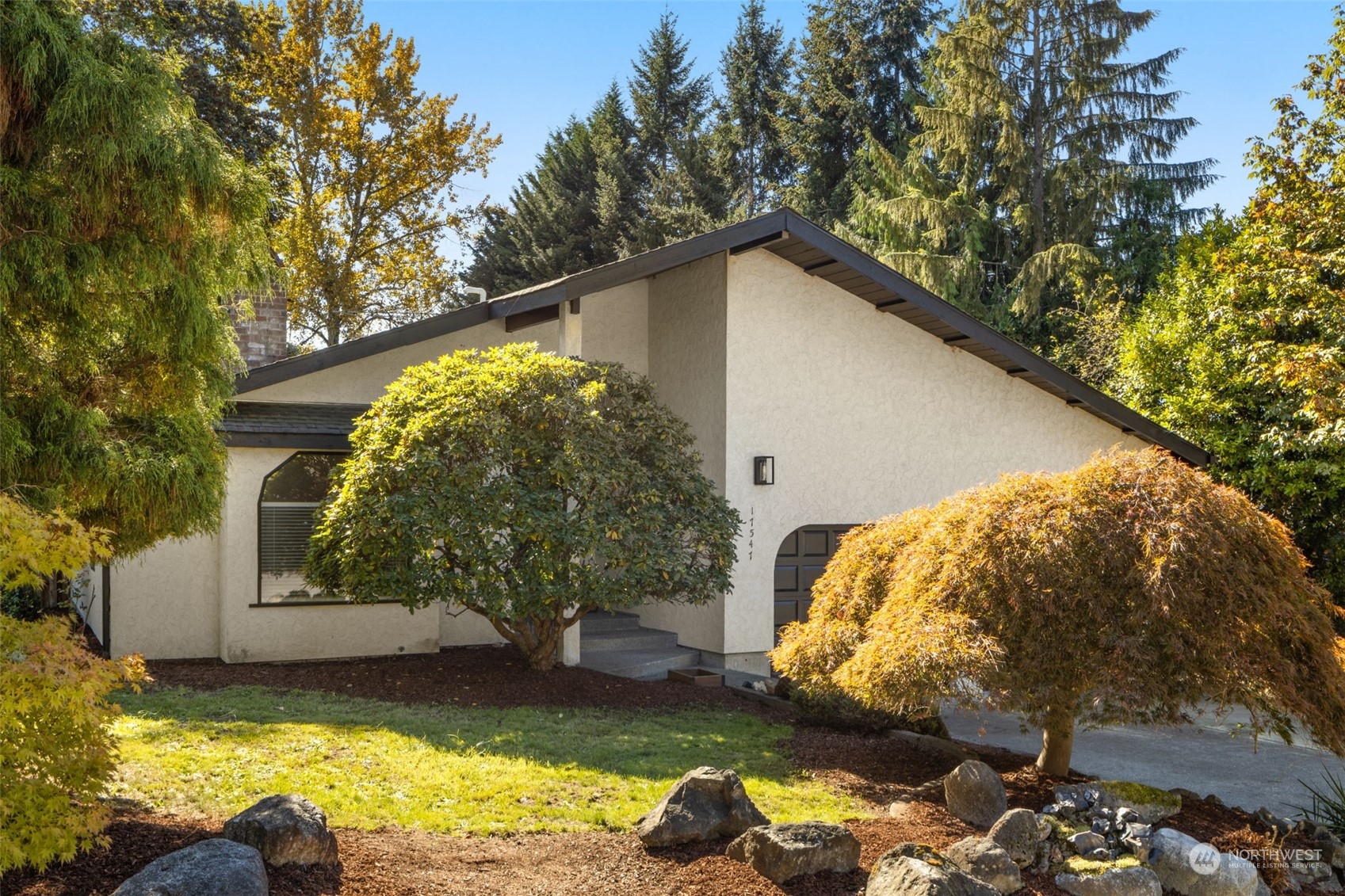 17547 Southeast 135th Street Renton, WA 98059 - Photo 37 of 37 a view of a house with a yard large tree and a yard