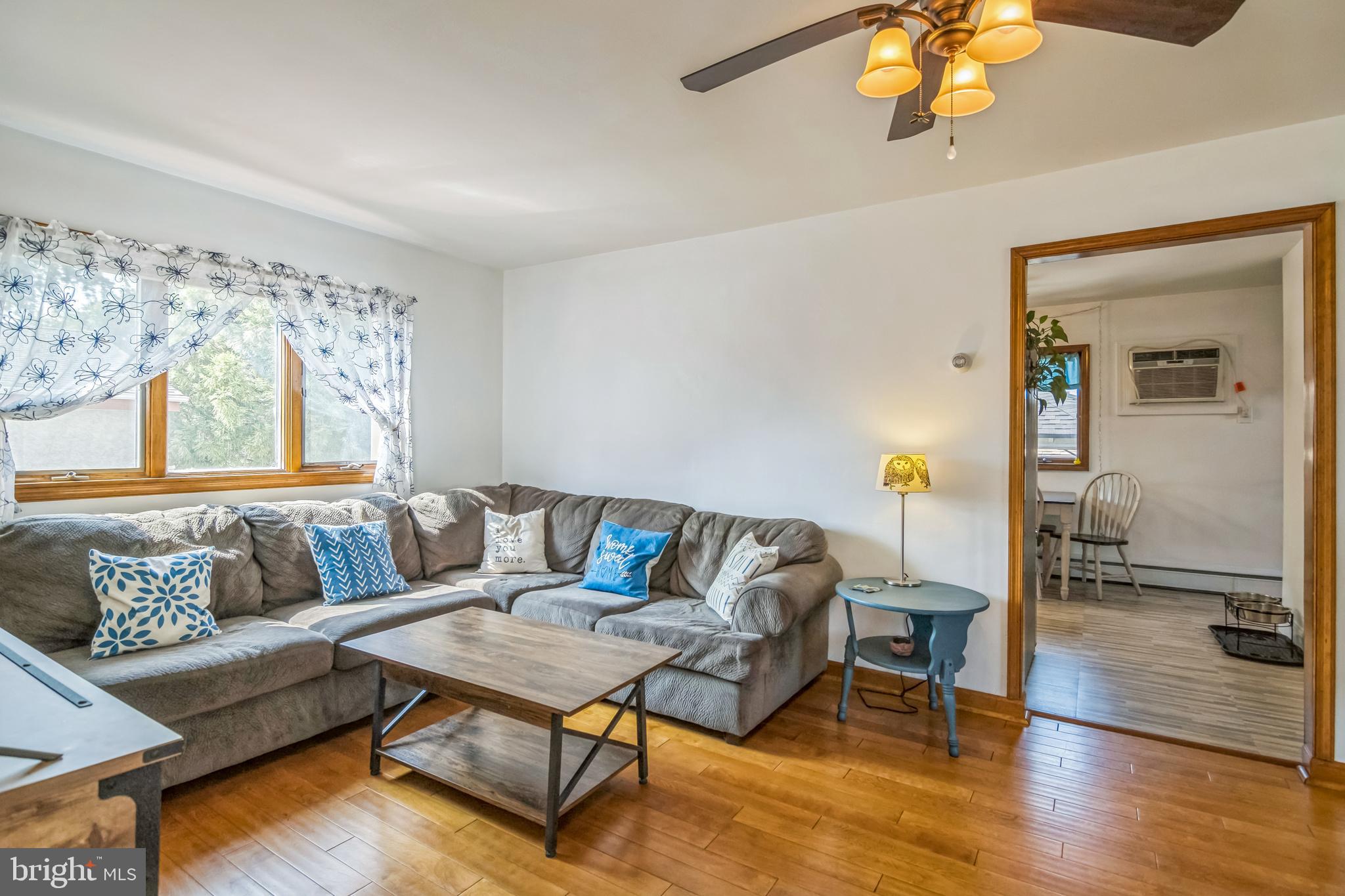 361 Amosland Road Holmes, PA 19043 - Photo 11 of 30 a living room with furniture and a table