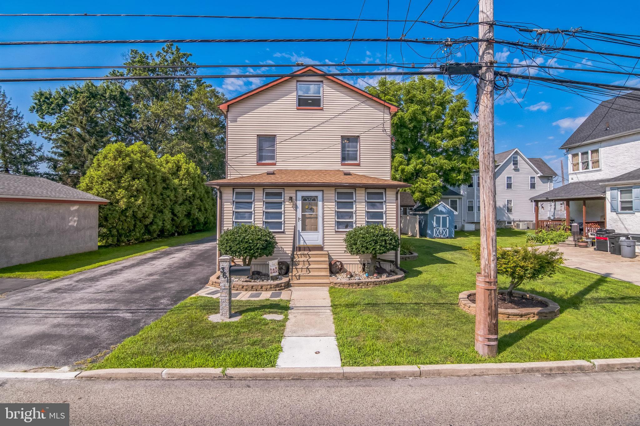 361 Amosland Road Holmes, PA 19043 - Photo 2 of 30 a front view of a house with a yard