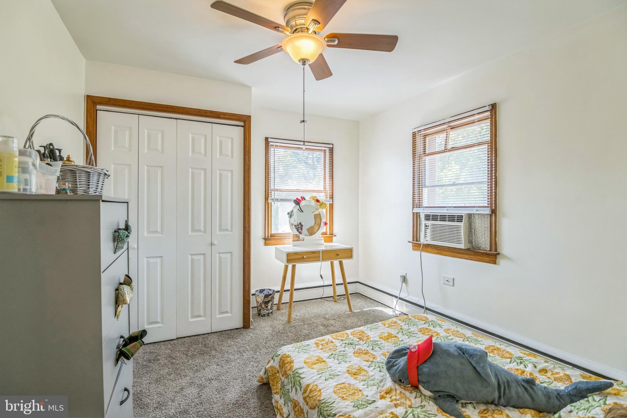 361 Amosland Road Holmes, PA 19043 - Photo 23 of 30 a living room with furniture and a window
