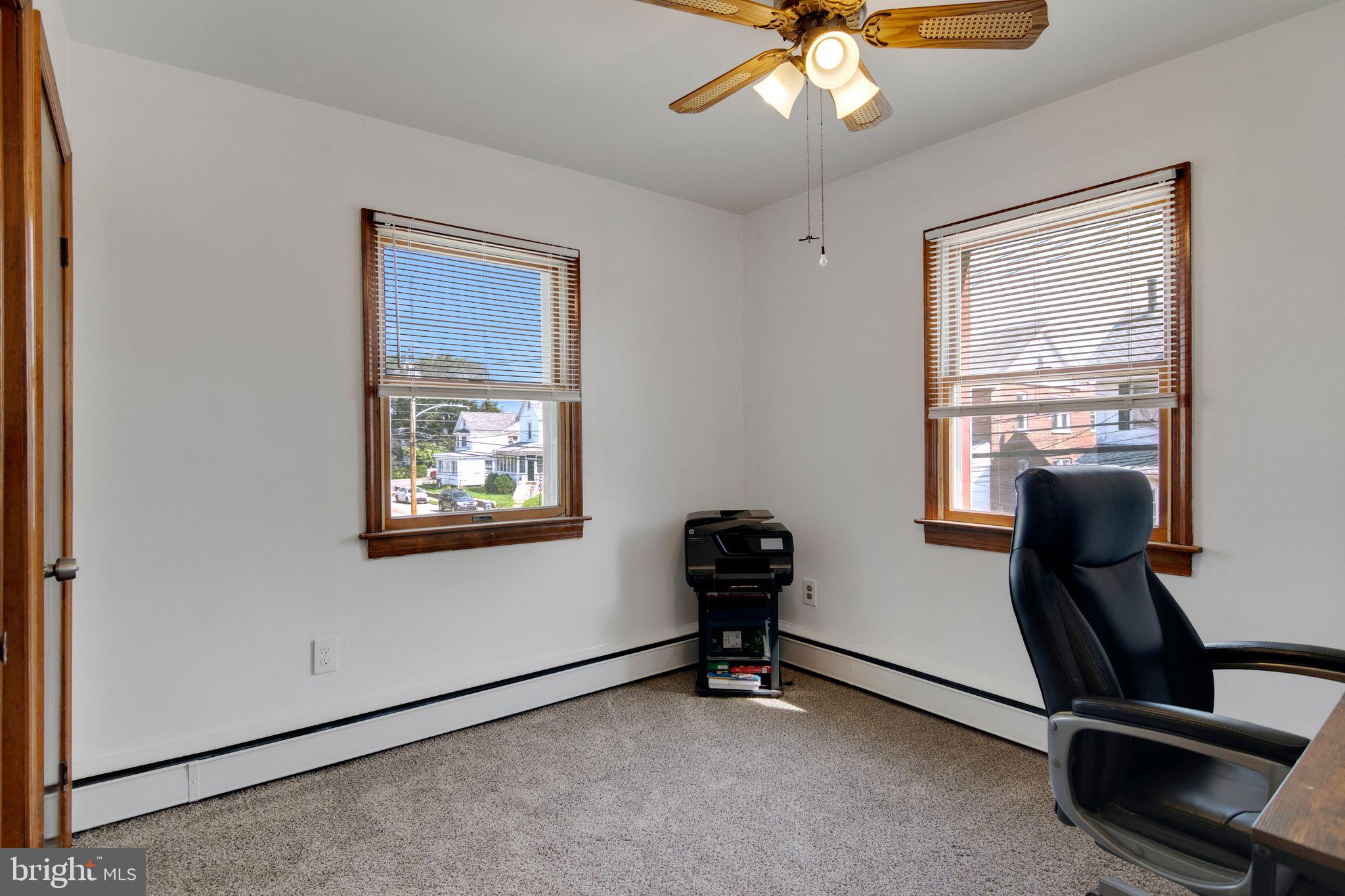 361 Amosland Road Holmes, PA 19043 - Photo 24 of 30 a view of a workspace with furniture and a window