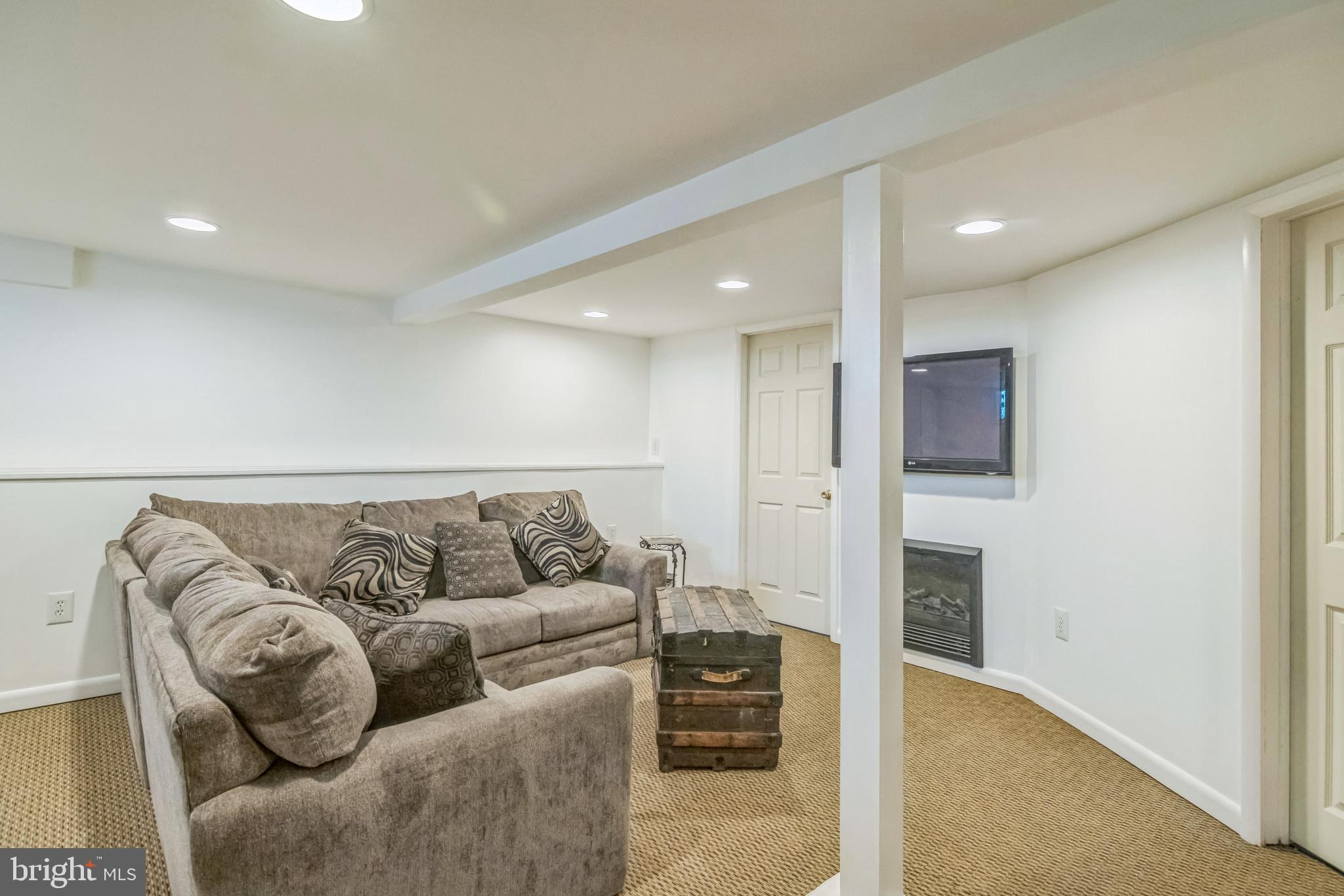 361 Amosland Road Holmes, PA 19043 - Photo 27 of 30 a living room with furniture and a couch