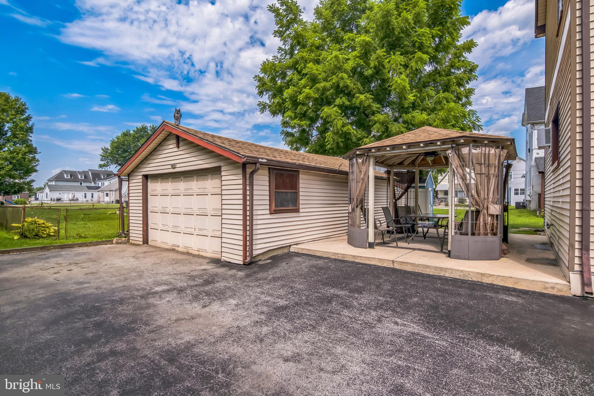 361 Amosland Road Holmes, PA 19043 - Photo 3 of 30 a view of a house with wooden fence