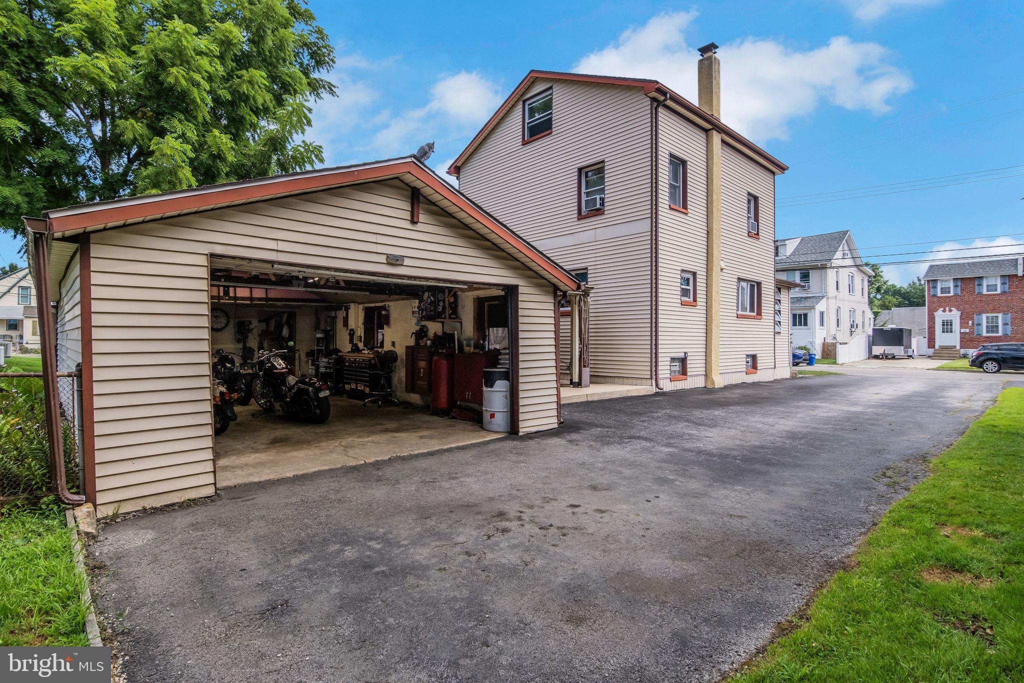 361 Amosland Road Holmes, PA 19043 - Photo 4 of 30 a view of a house and outdoor space