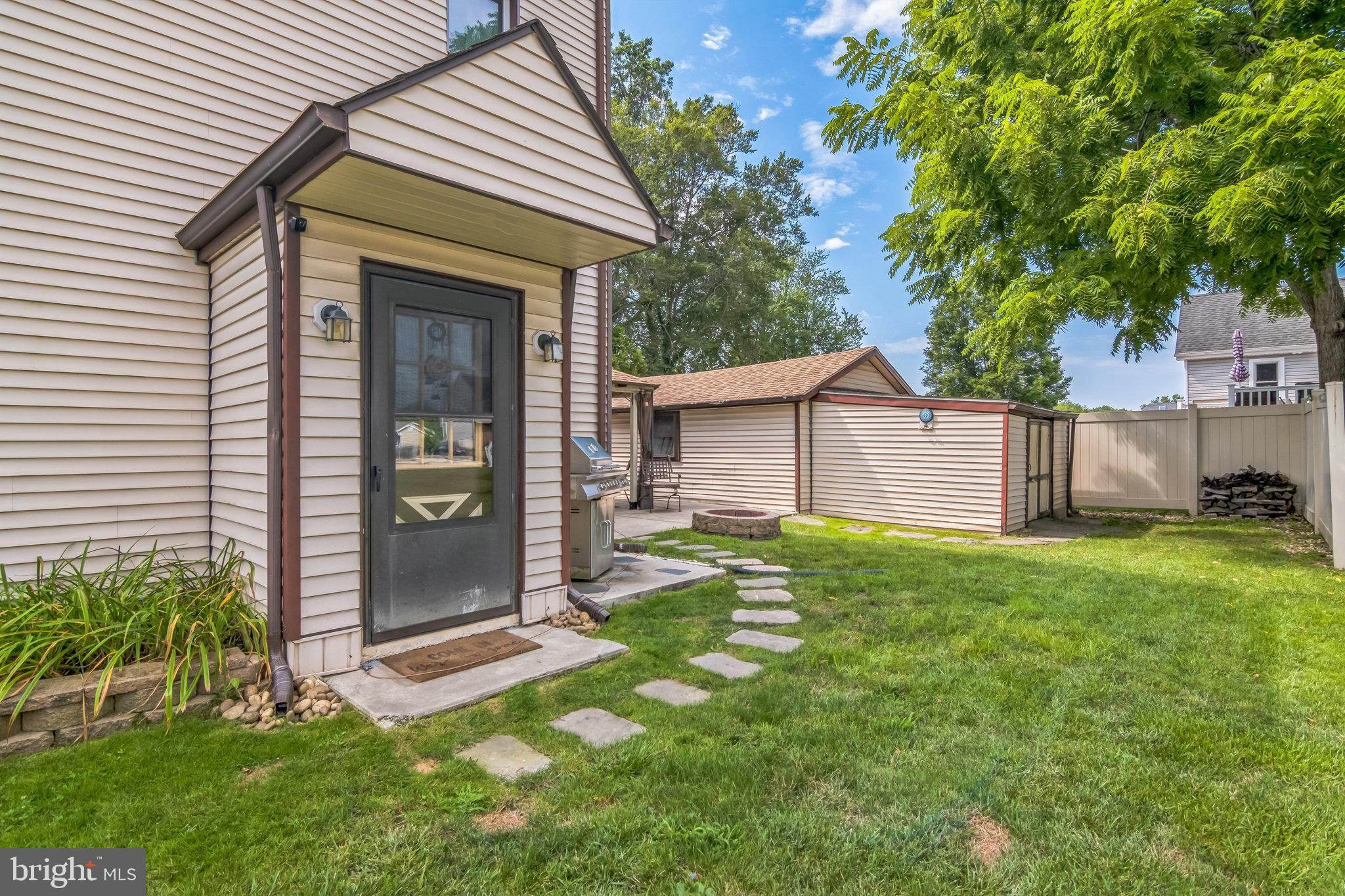 361 Amosland Road Holmes, PA 19043 - Photo 6 of 30 a view of a house with backyard