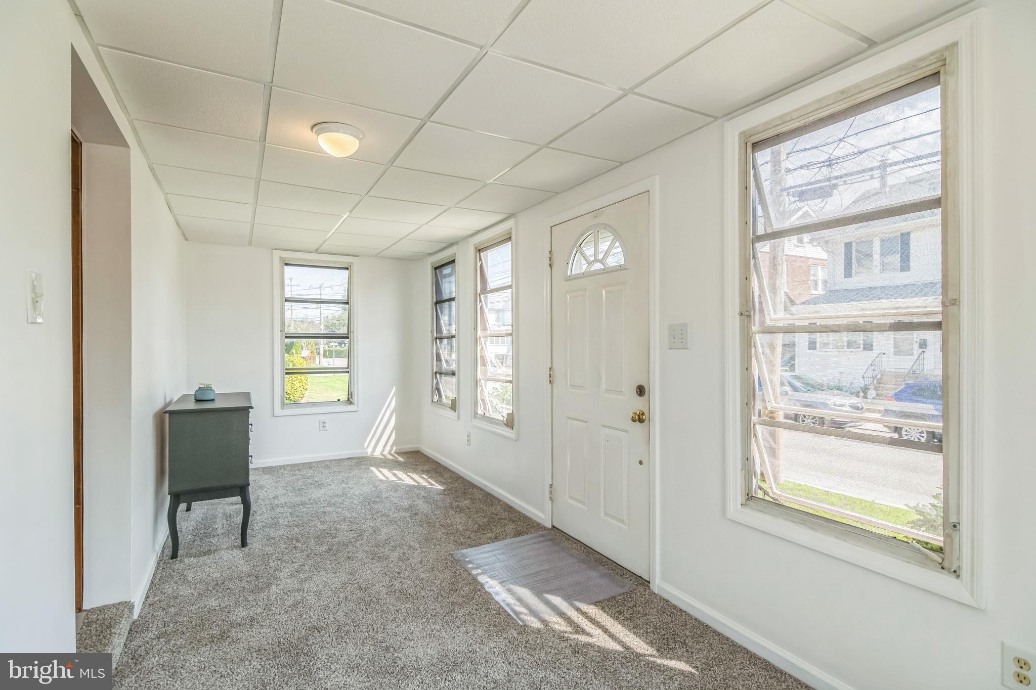 361 Amosland Road Holmes, PA 19043 - Photo 9 of 30 a view of an empty room with a window