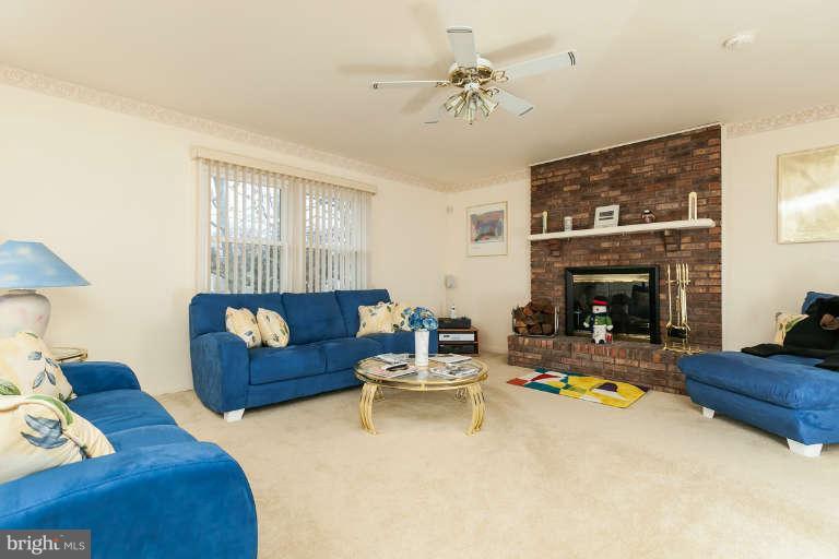 2001 Middleborough Road Baltimore, MD 21221 - Photo 3 of 30 a living room with furniture and a fireplace