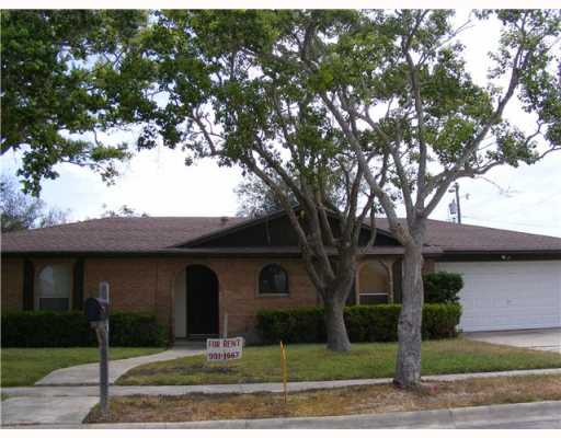 a front view of a house with yard