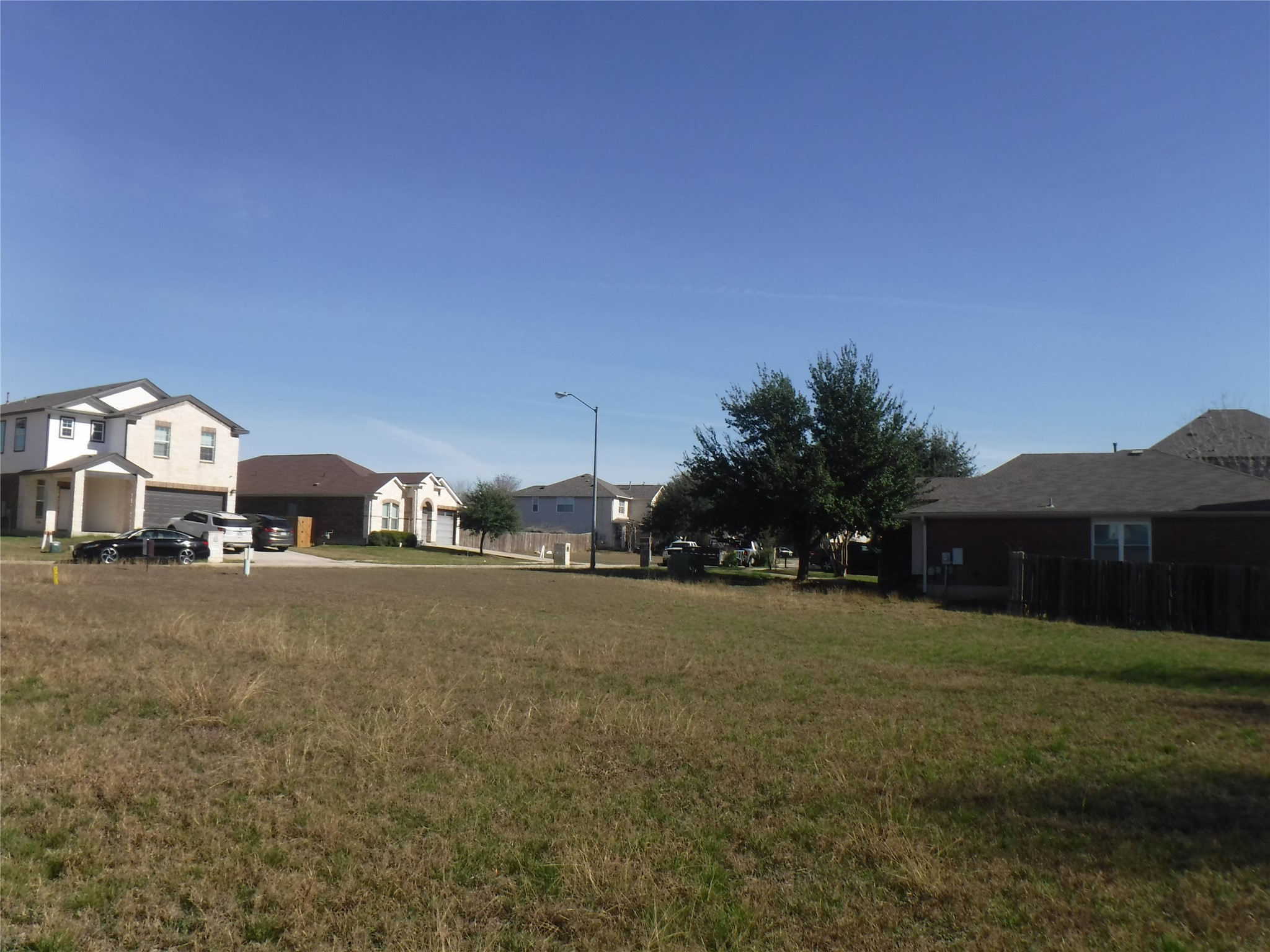 317 Gettysburg Loop Elgin, TX 78621 - Photo 2 of 14 View of yard with a residential view