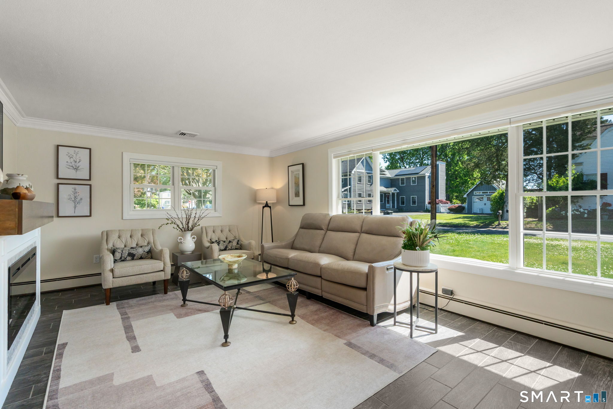 31 Cowan Street Suffield, CT 06078 - Photo 15 of 29 a living room with furniture and a large window