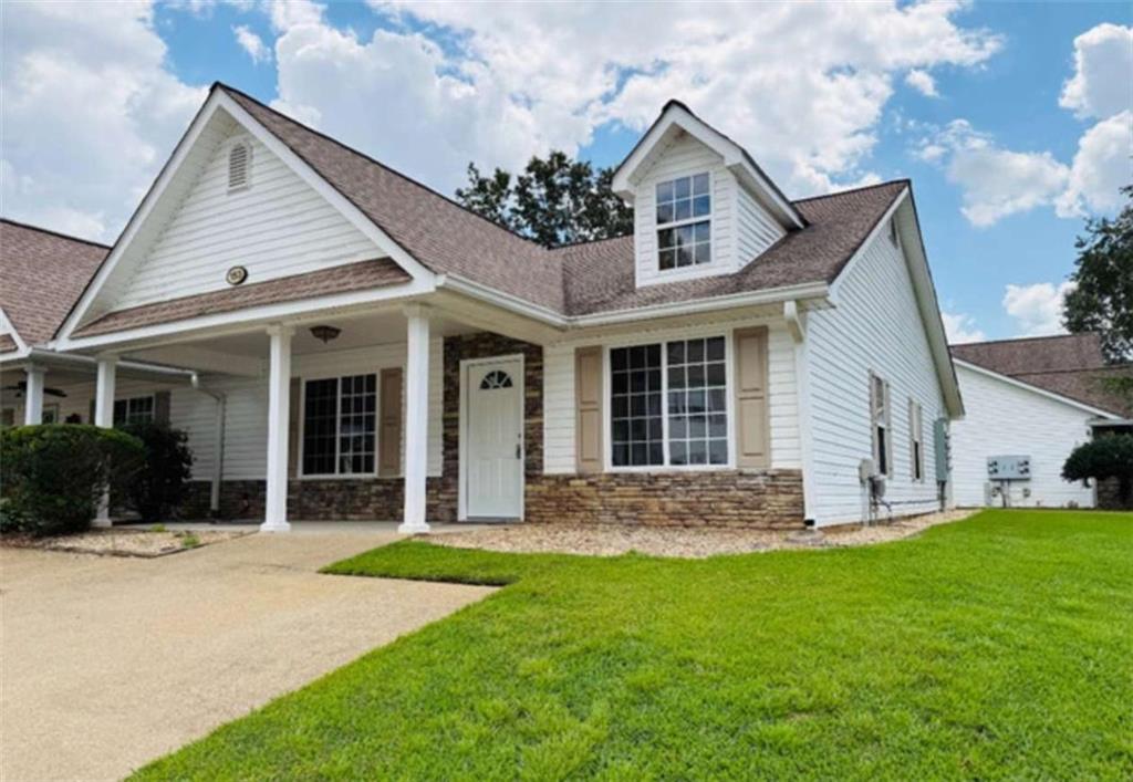 153 Crest Pointe Bremen, GA 30110 - Photo 1 of 24 front view of a house with a yard