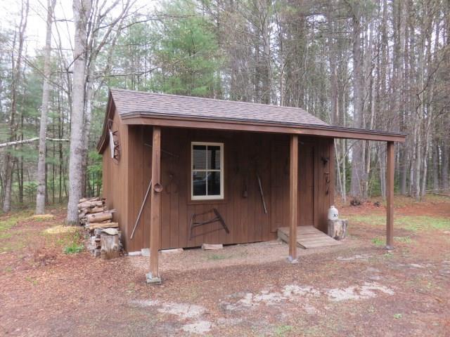90 Little River Road Lebanon, ME 04027 - Photo 10 of 34 The cute shed has good storage and a...