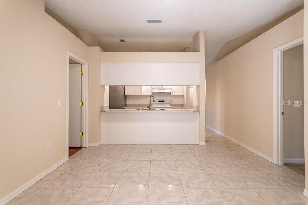 2405 Timbercreek Loop East Lakeland, FL 33805 - Photo 13 of 48 a view of kitchen with stainless steel appliances cabinets