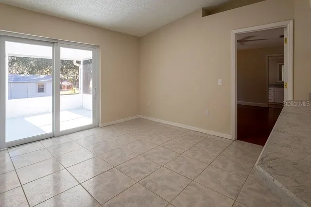 a view of an empty room and window