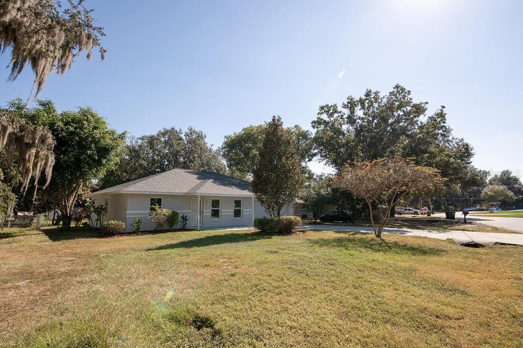 2405 Timbercreek Loop East Lakeland, FL 33805 - Photo 41 of 48 a house with swimming pool in front of it