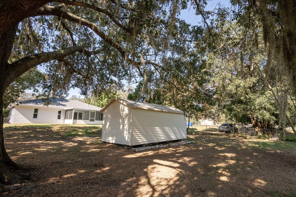 2405 Timbercreek Loop East Lakeland, FL 33805 - Photo 46 of 48 a view of house with yard