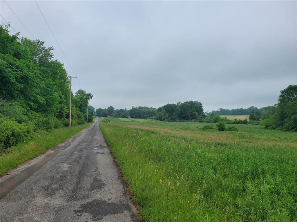 13-xx Mercer-grove City Road Mercer, PA 16137 - Photo 3 of 7 a view of a river and garden with trees in the background