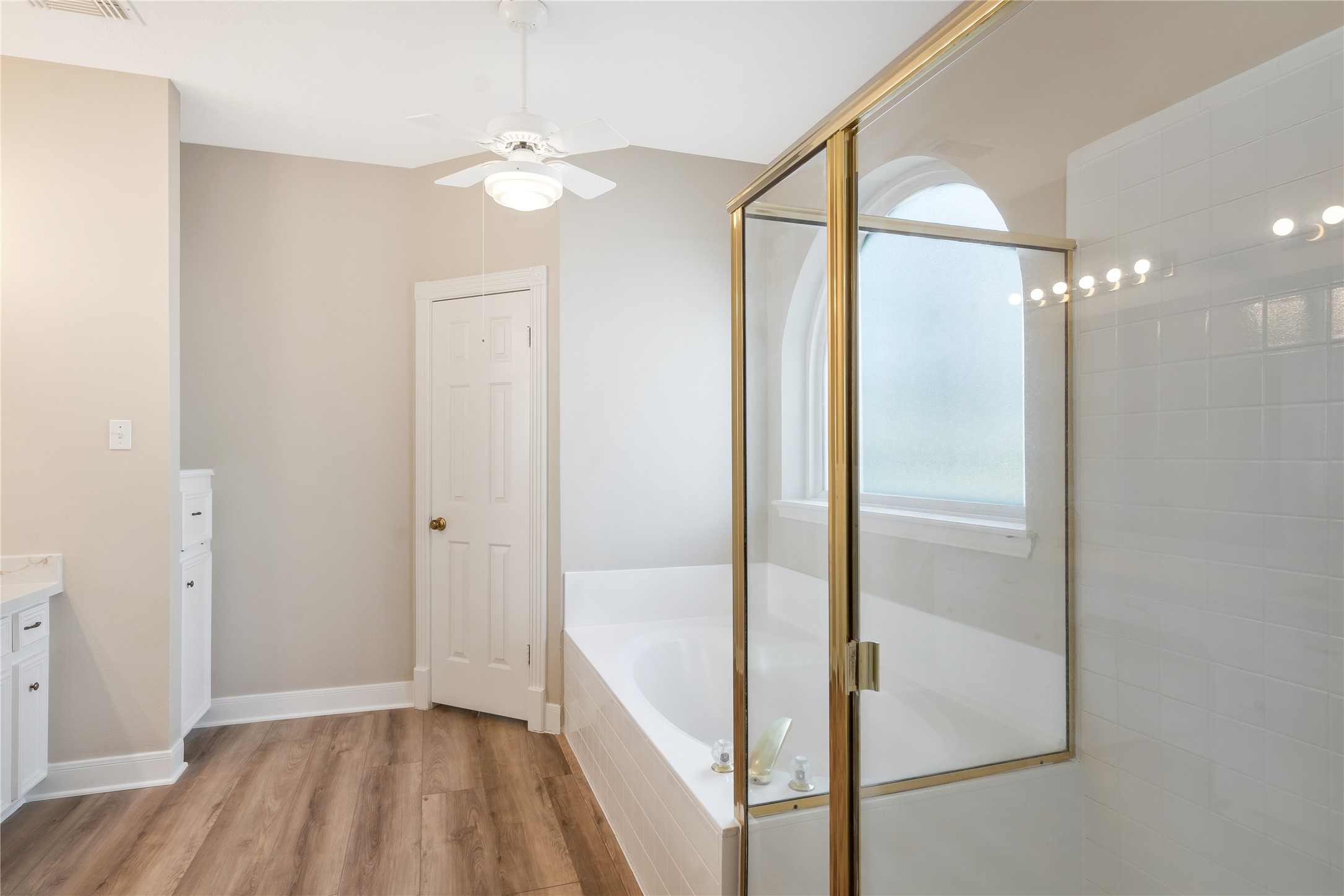 8011 Null Court Spring, TX 77379 - Photo 23 of 41 Primary bath with separate tub and shower.