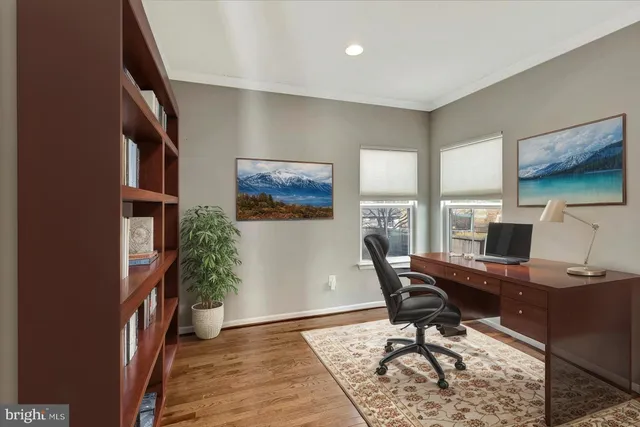 a workspace with furniture and a window