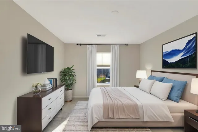 a utility room with cabinets washer and dryer