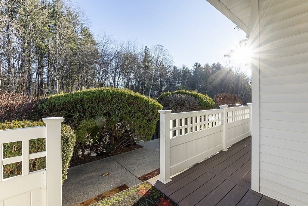 360 Littleton Road, Unit F2 Chelmsford, MA 01824 - Photo 20 of 27 a view of a deck with a yard
