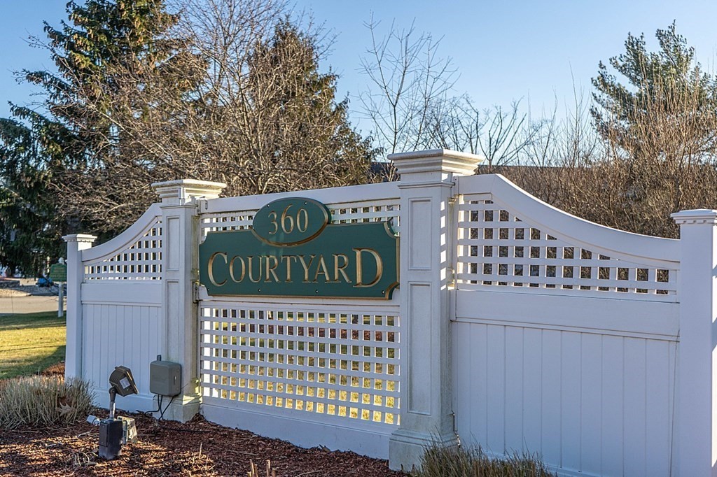 360 Littleton Road, Unit F2 Chelmsford, MA 01824 - Photo 2 of 27 a sign on the side of a building