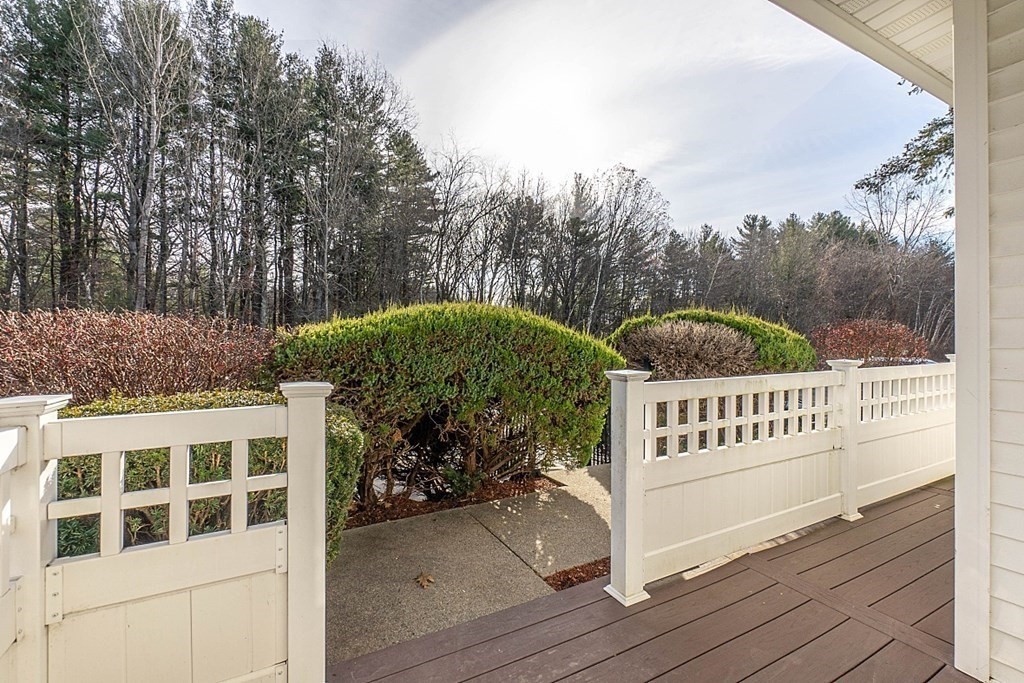 360 Littleton Road, Unit F2 Chelmsford, MA 01824 - Photo 21 of 27 a view of a deck with a yard