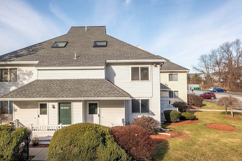 360 Littleton Road, Unit F2 Chelmsford, MA 01824 - Photo 23 of 27 a view of a house with a yard