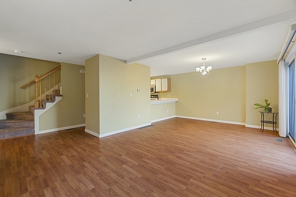 360 Littleton Road, Unit F2 Chelmsford, MA 01824 - Photo 7 of 27 a view of empty room with wooden floor