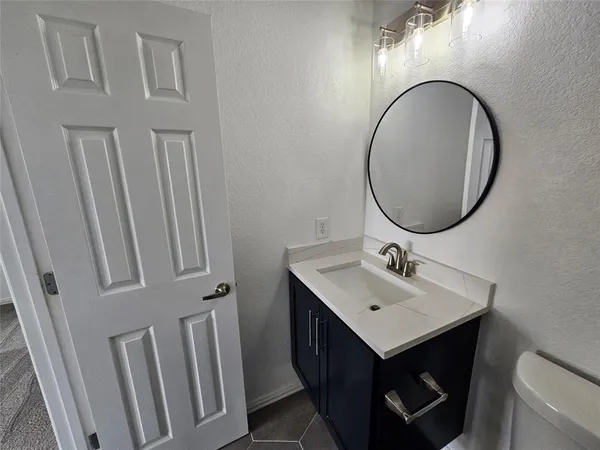 a bathroom with a toilet bathtub and shower