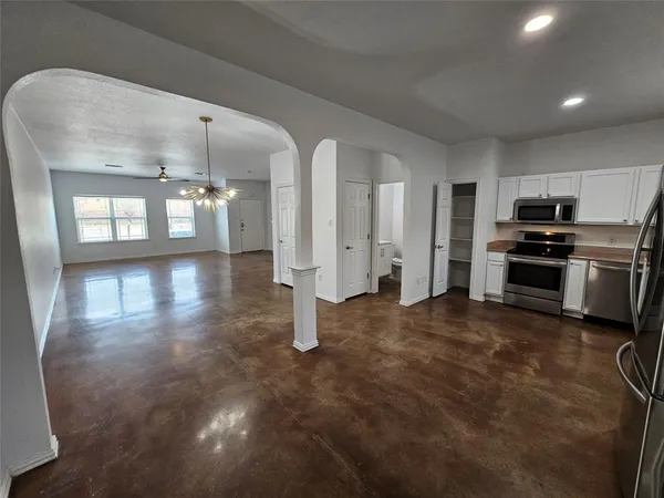 a view of a house with wooden floor