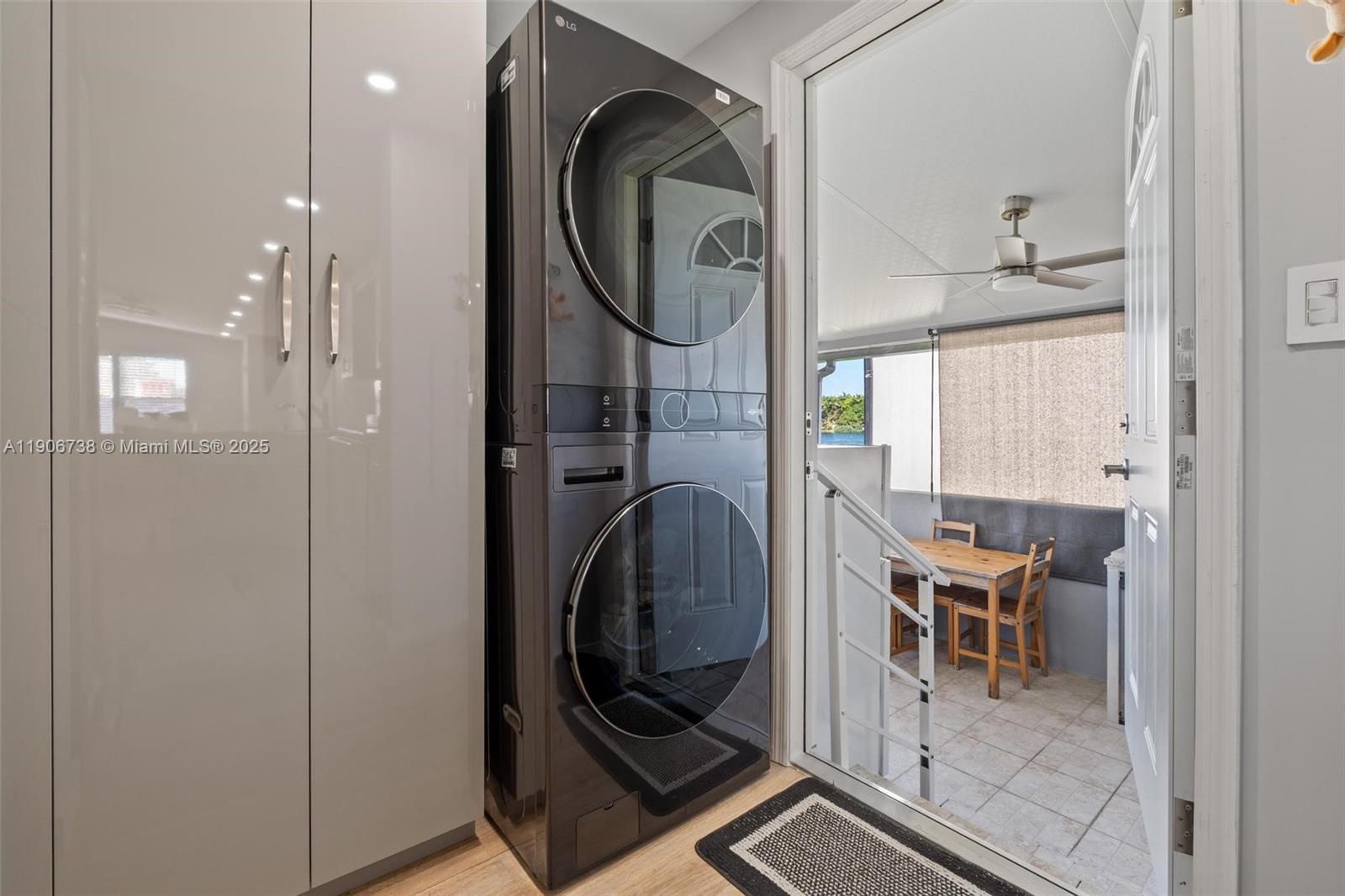 5305 Northwest 202nd Terrace Miami Gardens, FL 33055 - Photo 14 of 40 a view of a hallway with washer and dryer