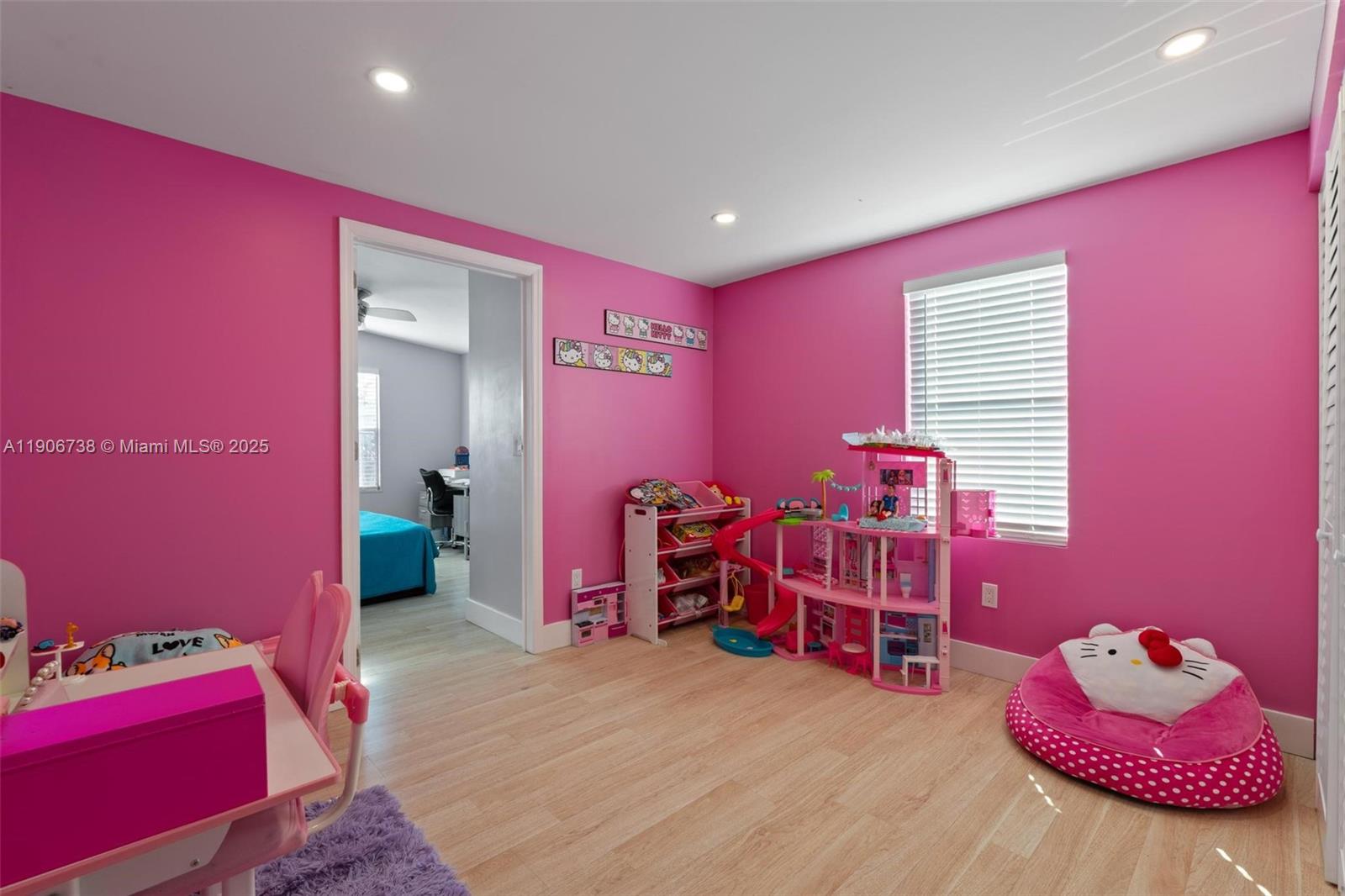 5305 Northwest 202nd Terrace Miami Gardens, FL 33055 - Photo 21 of 40 a bedroom with a bed and a room