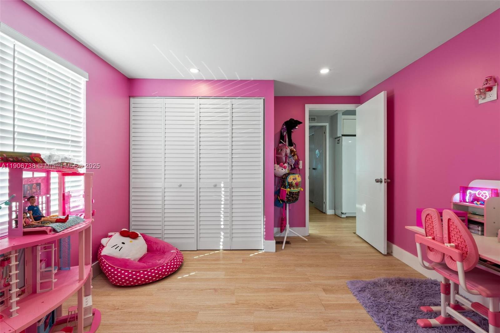 5305 Northwest 202nd Terrace Miami Gardens, FL 33055 - Photo 22 of 40 a bedroom with a bed and a window