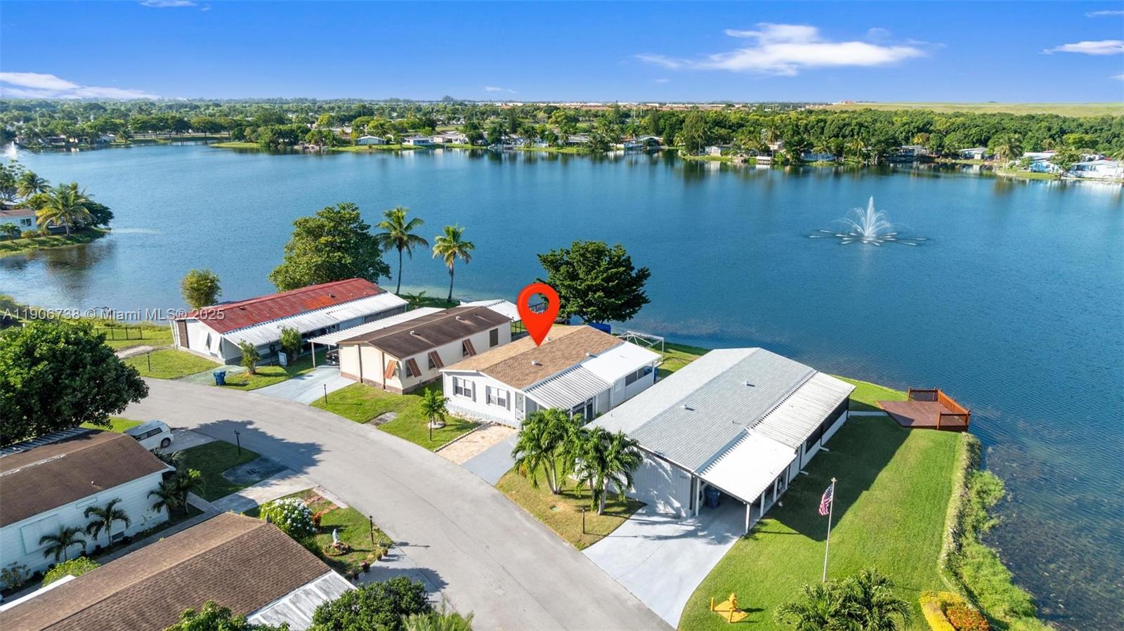 5305 Northwest 202nd Terrace Miami Gardens, FL 33055 - Photo 27 of 40 an aerial view of a house with outdoor space and lake view