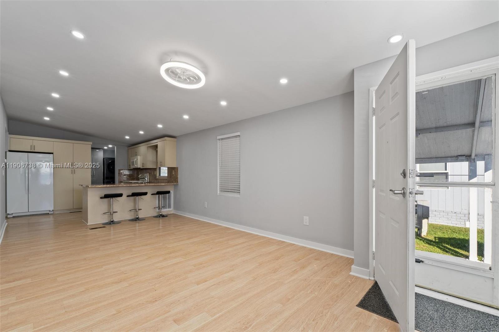 5305 Northwest 202nd Terrace Miami Gardens, FL 33055 - Photo 7 of 40 a view of kitchen with furniture and refrigerator