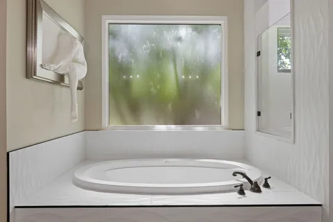 a bathroom with a bathtub