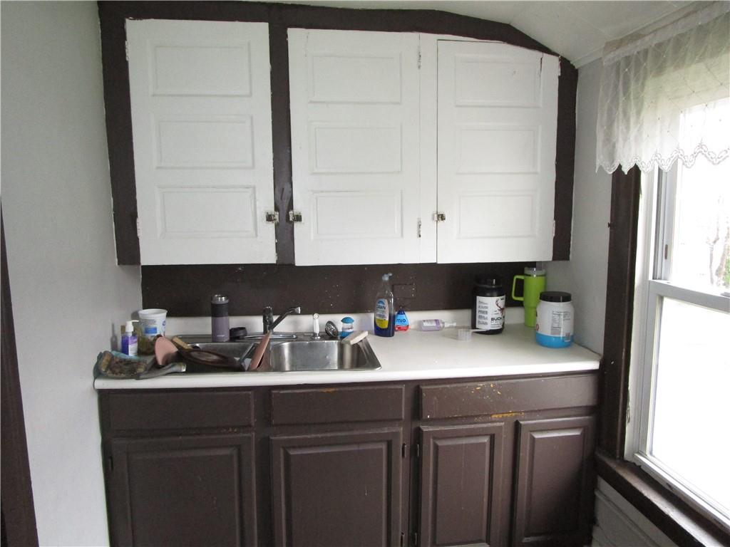 220 Mercer Street Butler, PA 16001 - Photo 6 of 12 a kitchen with a sink cabinets and appliances