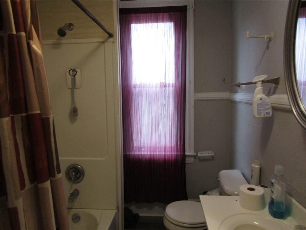 220 Mercer Street Butler, PA 16001 - Photo 8 of 12 a bathroom with a sink toilet and shower